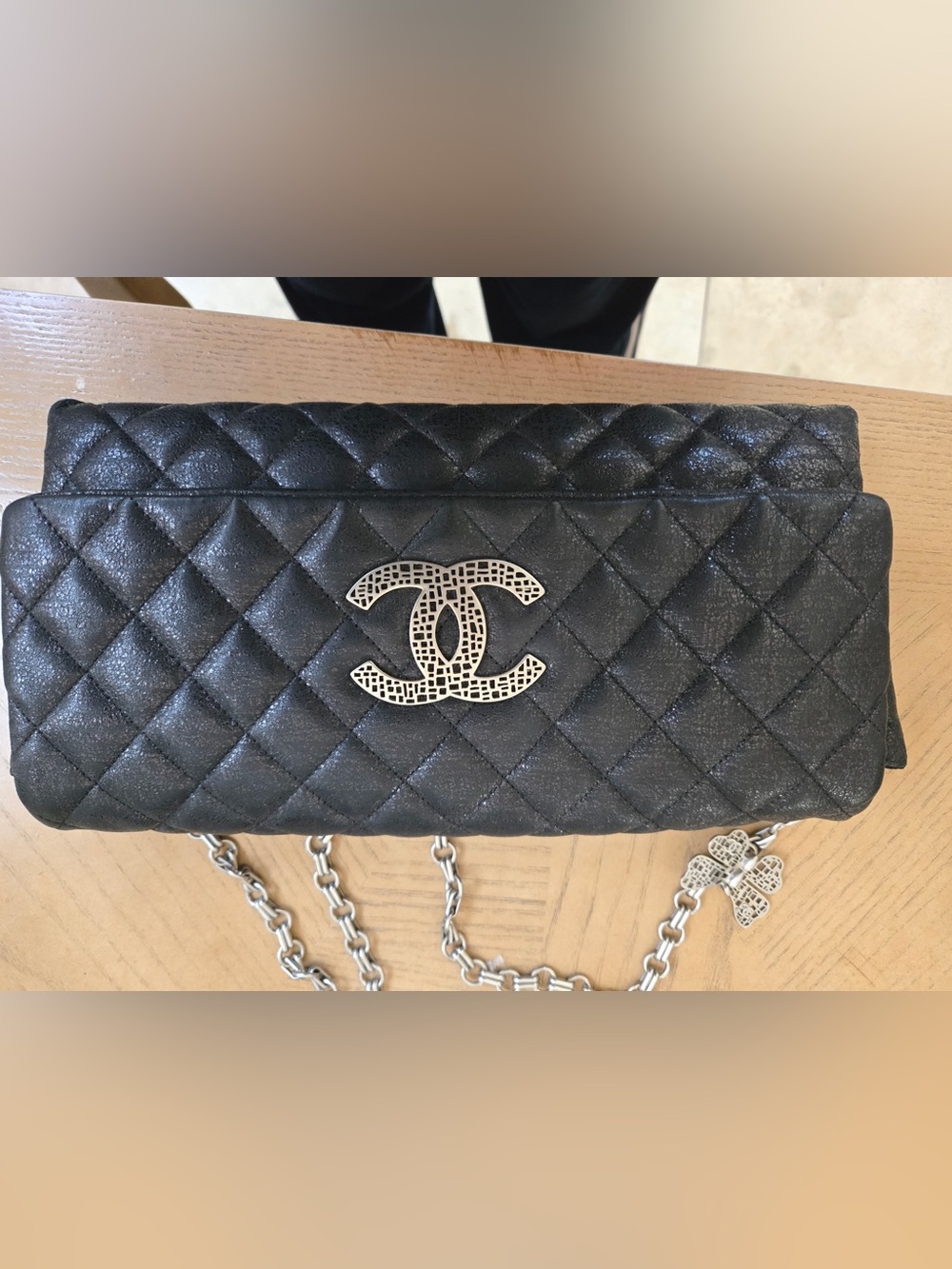 CHANEL Black Quilted Bag with Silver-Tone CC Emblem and Butterly on the chain